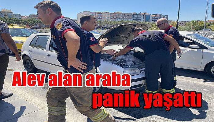 Alev alan araba panik yaşattı