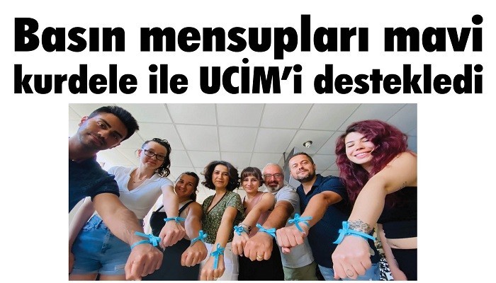 Basın mensupları mavi kurdele ile UCİM’i destekledi