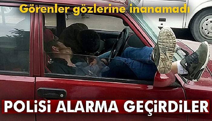 Direksiyon başında sızan sürücü ile arkadaşı polisi harekete geçirdi