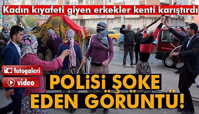 Sokakta kadın kıyafeti giymiş erkeklerin oyunu polisin dikkatini çekti