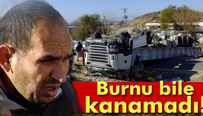 Ters dönen tırdan burnu bile kanamadan çıktı