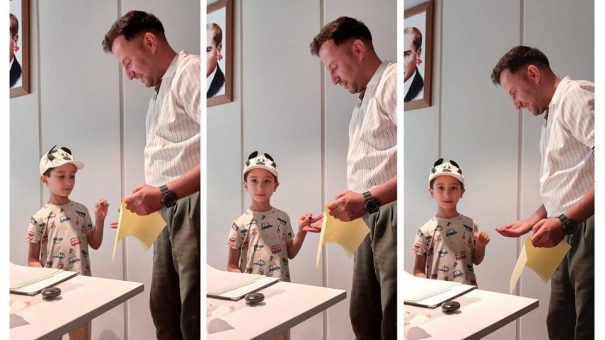 6 yaşındaki Ali Ateş Alp, Troya Müzesi’ne Roma dönemine ait sikke bağışladı