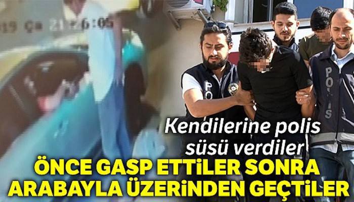 Polisiz diyerek turisti gasp ettiler, arabayla üzerinden geçtiler
