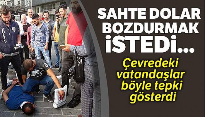 Sahte dolar bozdurmak isterken yakalandı