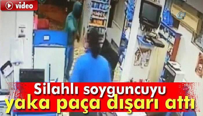  Silahlı soyguncuya böyle direndi 
