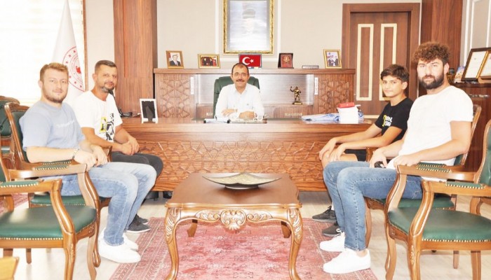 BAŞARILI SPORCU KAYMAKAM DOLU’YU ZİYARET ETTİ