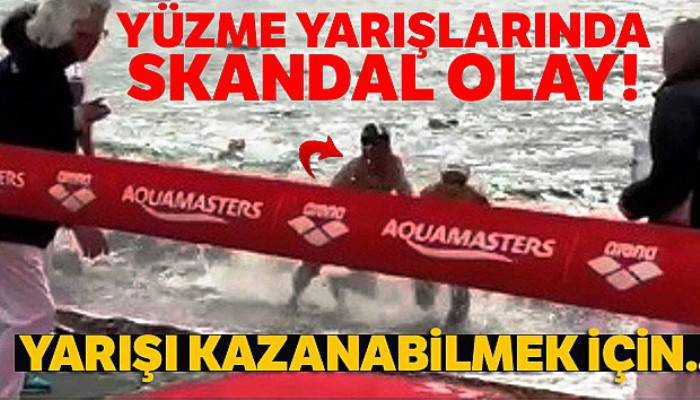 Yarışı kazanabilmek için çocuk sporcuyu iterek denize düşürdü