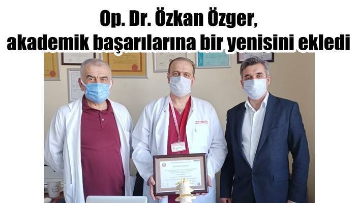 Op. Dr. Özkan Özger, akademik başarılarına bir yenisini ekledi