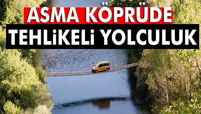 Asma köprüde tehlikeli yolculuk