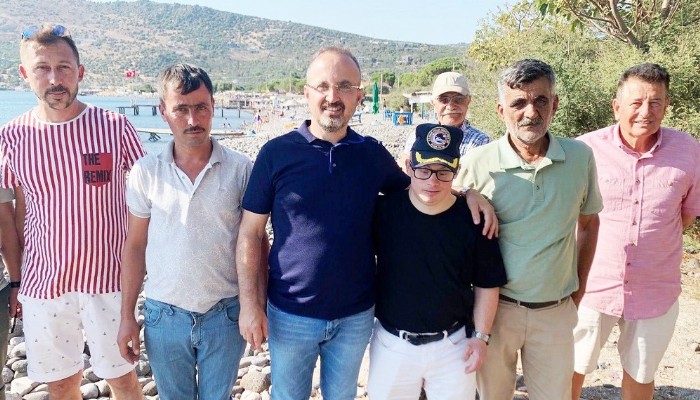 Turan Assos bölgesinde muhtarlarla ve turizm işletmecileriyle bir araya geldi