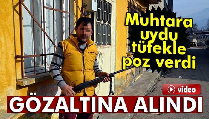 Muhtara uydu, tüfekle poz verdi gözaltına alındı